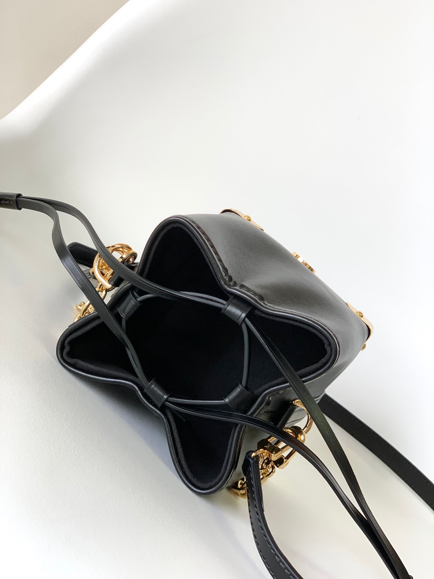 Louis Vuitton Luxury Black Leather Bucket Crossbody Bag with Gold Hardware