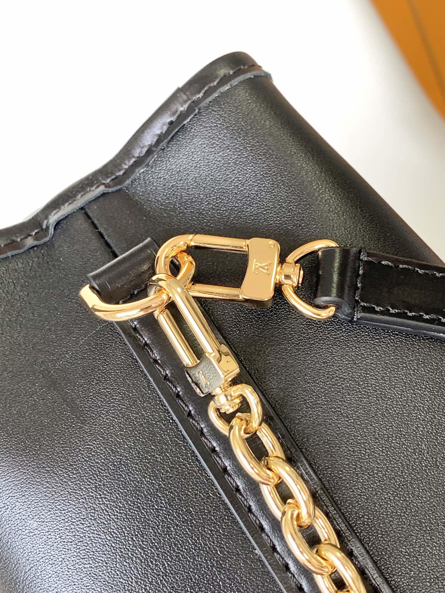 Louis Vuitton Black Leather Bucket Handbag with Gold-Tone Hardware &amp; Chain