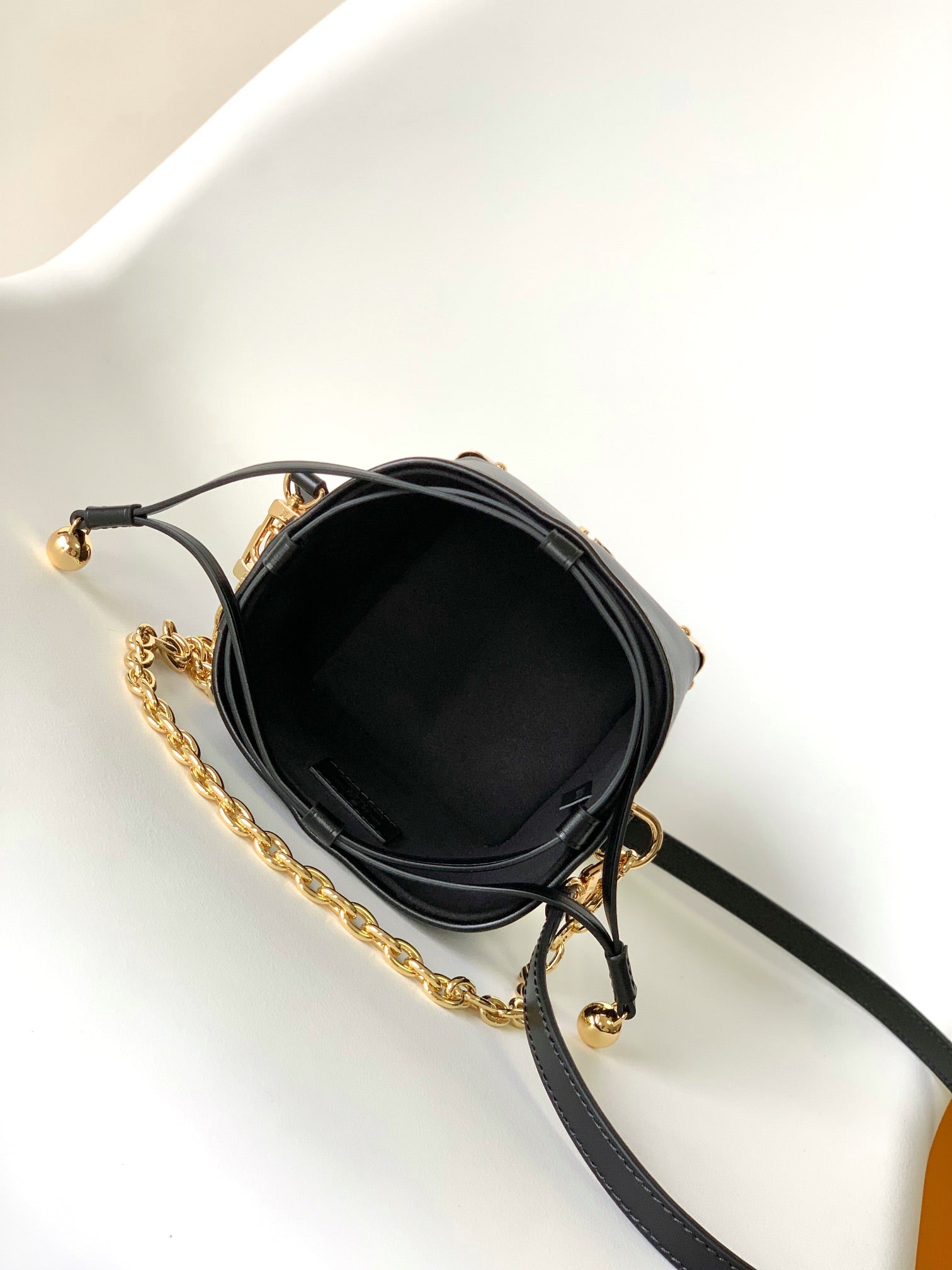 Louis Vuitton Luxury Black Leather Bucket Crossbody Bag with Gold Hardware