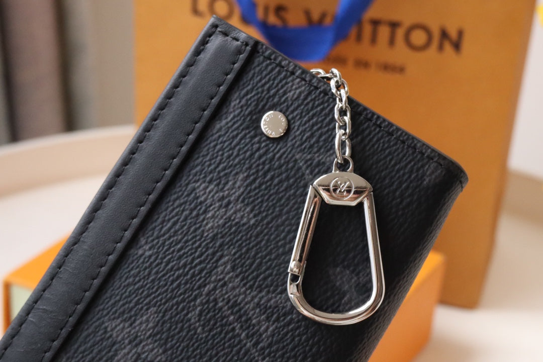 Louis Vuitton Black Embossed Pattern Leather Zip Around Wallet Clutch
