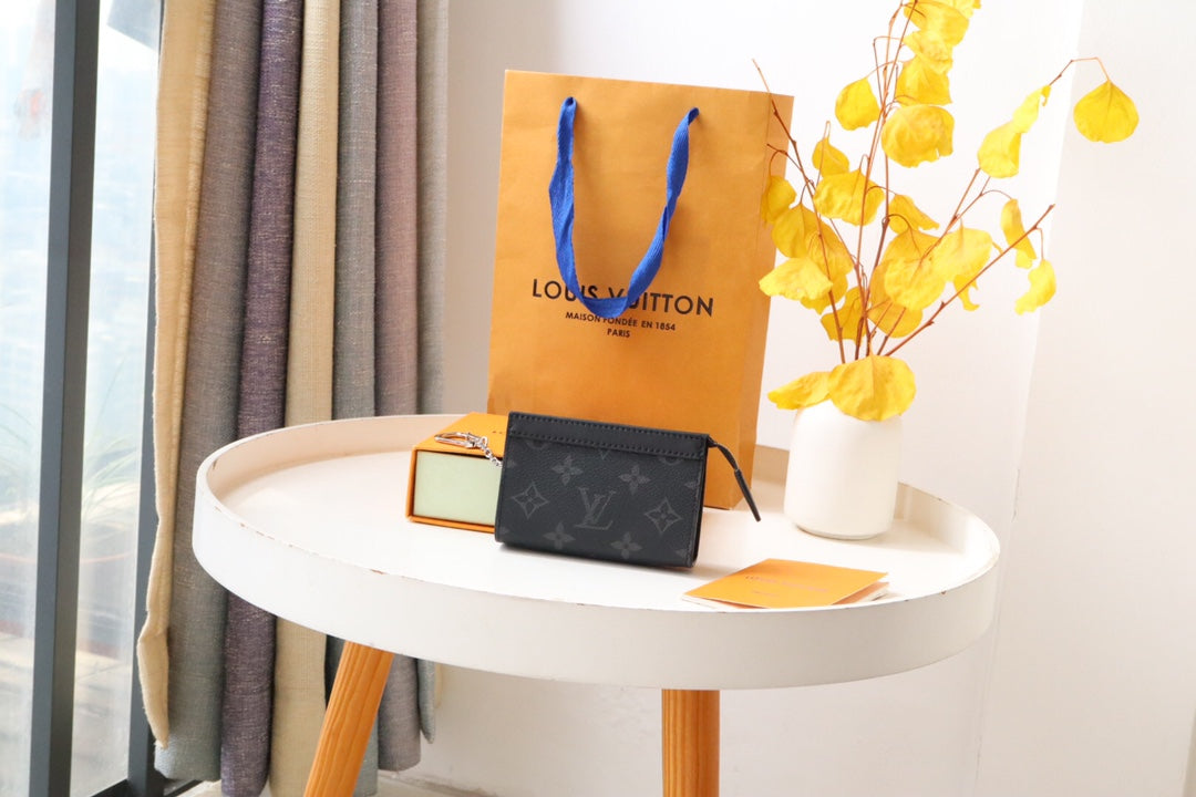 Louis Vuitton Black Embossed Pattern Leather Zip Around Wallet Clutch