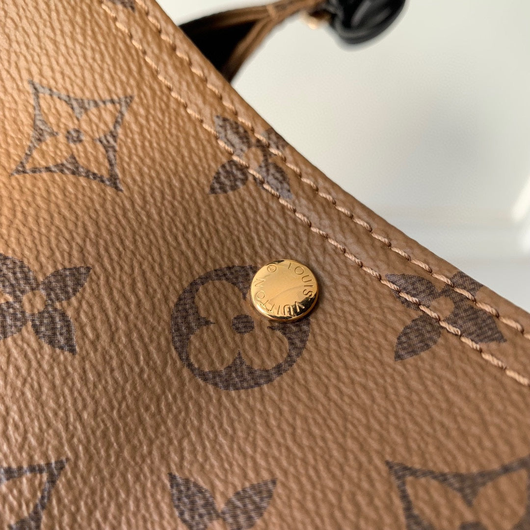 Louis Vuitton Brown Monogram Asymmetric Triangle Top Handle Leather Bag