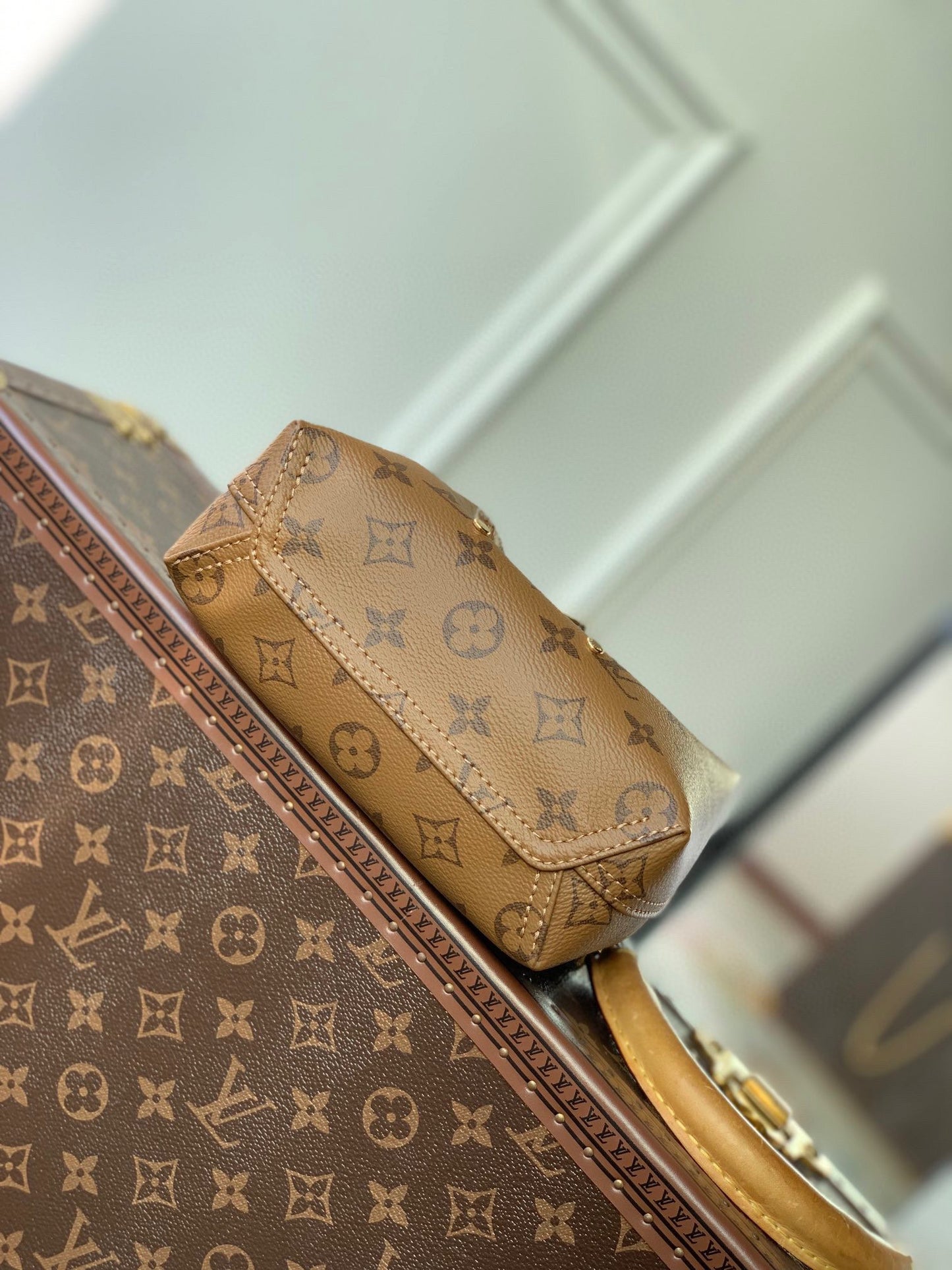 Louis Vuitton Brown Monogram Asymmetric Triangle Top Handle Leather Bag