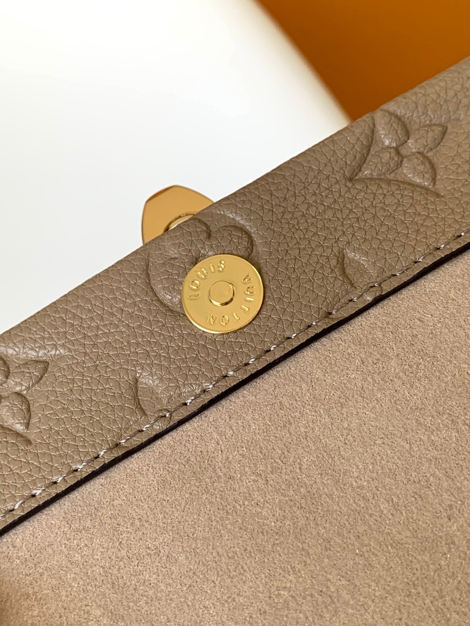 Louis Vuitton Elegant Taupe Embossed Leather Flap Handbag with Gold Chain Strap