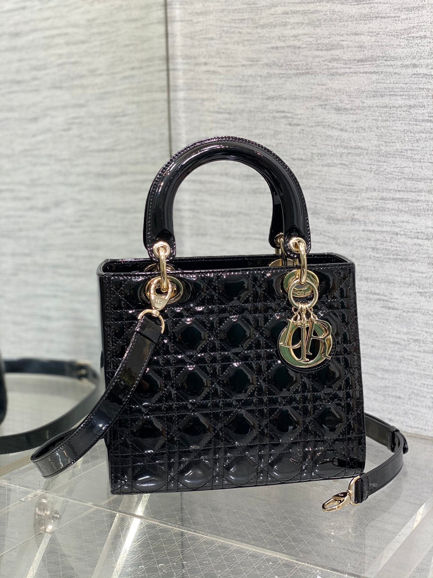 Dior Elegant Black Quilted Patent Leather Mini Handbag with Gold Hardware
