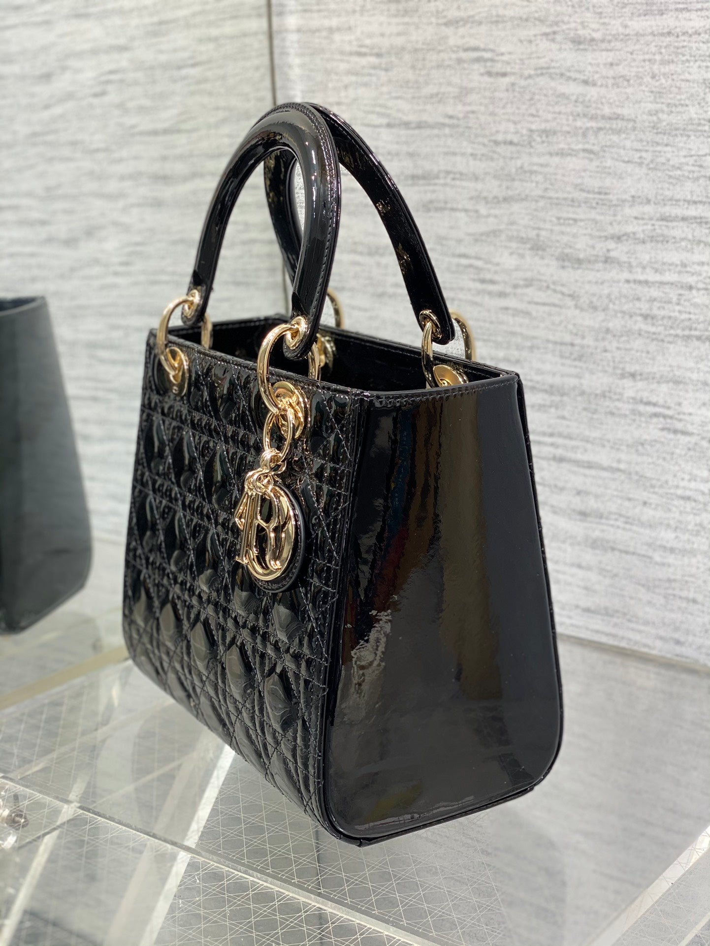 Dior Elegant Black Quilted Patent Leather Mini Handbag with Gold Hardware