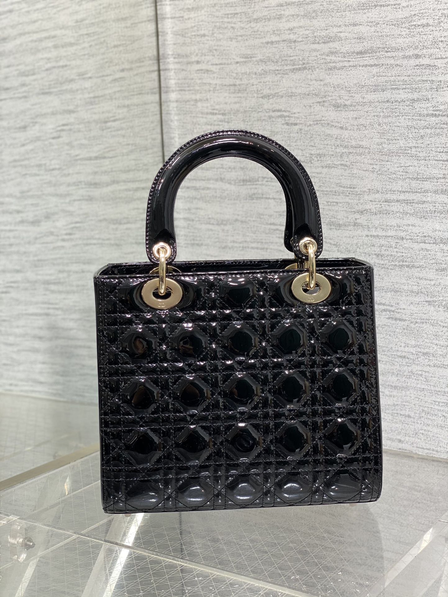 Dior Elegant Black Quilted Patent Leather Mini Handbag with Gold Hardware