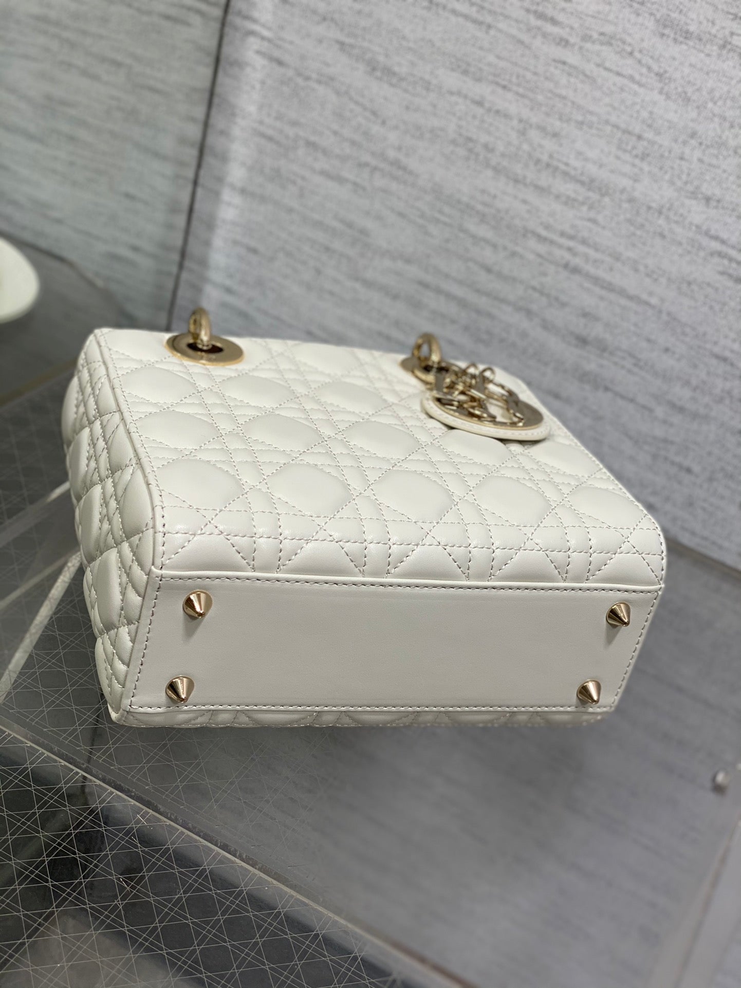 Dior White Quilted Leather Handbag with Gold Charms and Wide Strap