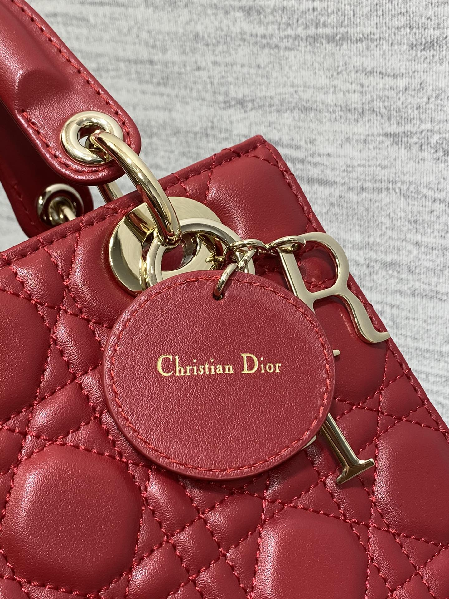 Dior Red Quilted Leather Mini Handbag with Top Handle and Shoulder Strap