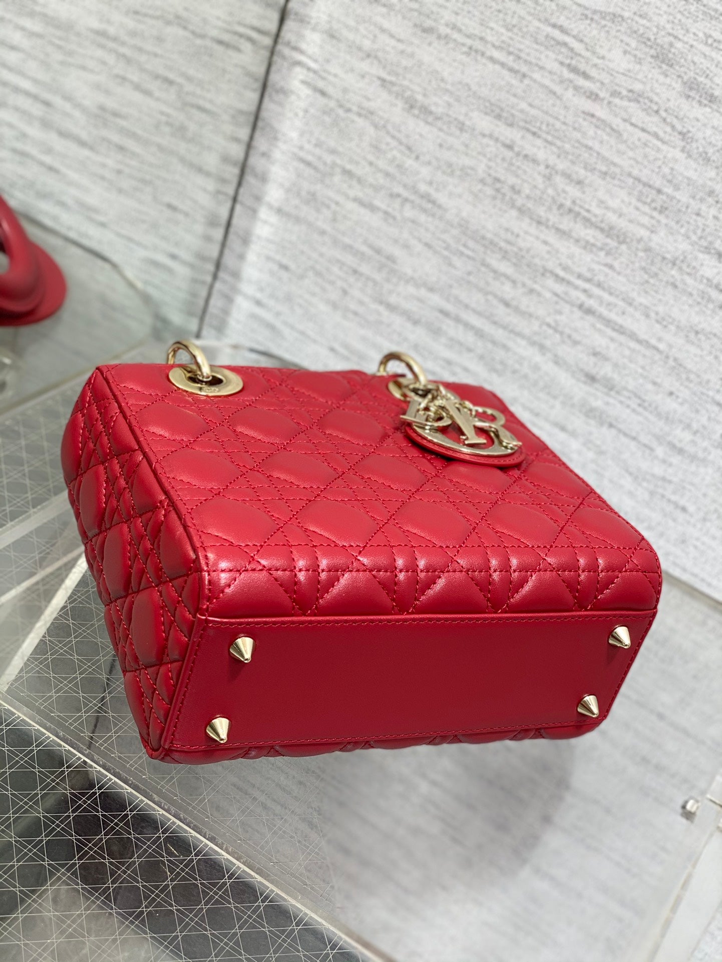 Dior Red Quilted Leather Top Handle Bag with Gold Charms and Crossbody Strap