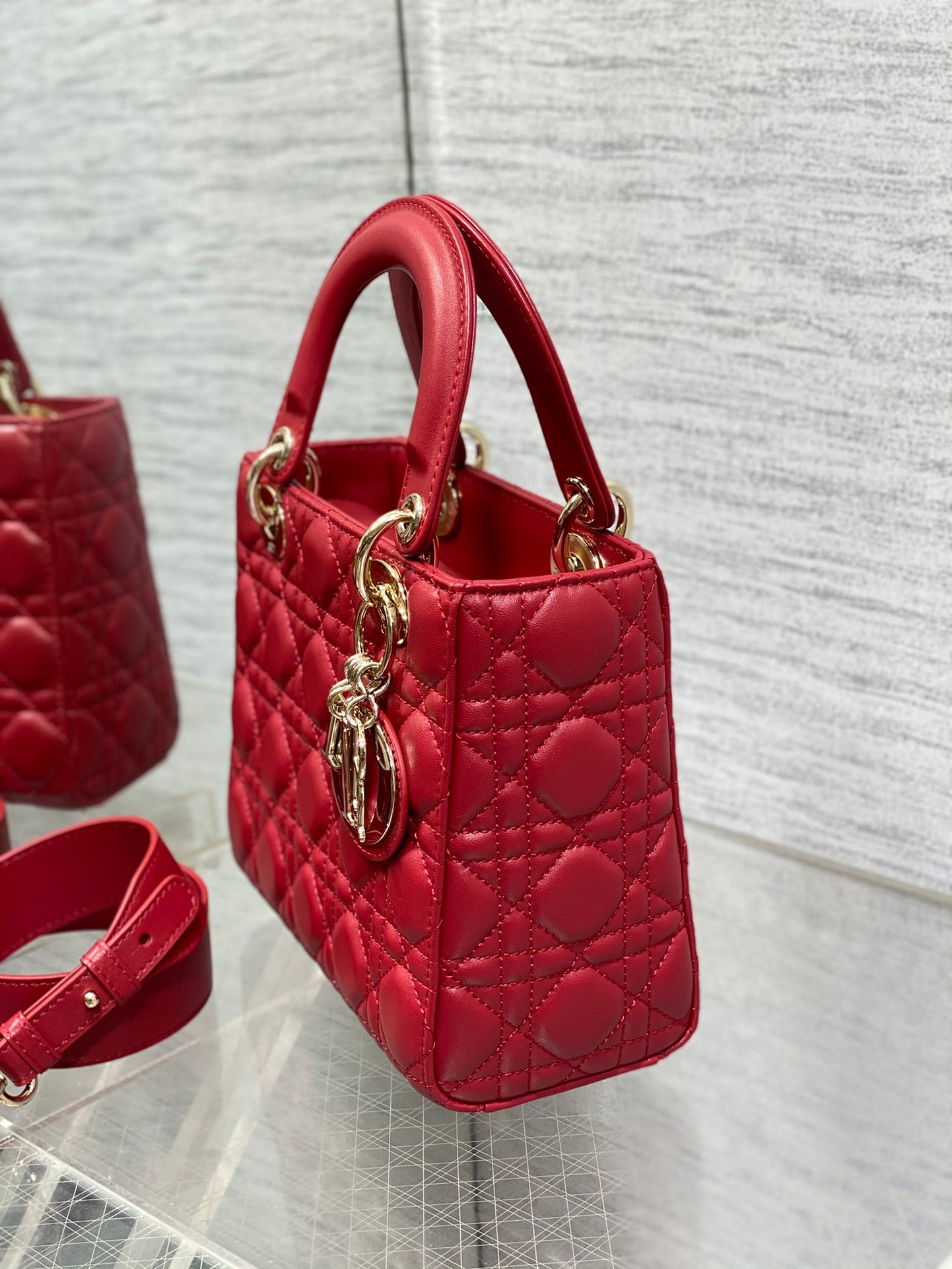 Dior Red Quilted Leather Top Handle Bag with Gold Charms and Crossbody Strap