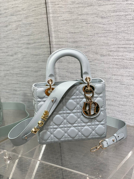 Dior Elegant Light Blue Quilted Leather Handbag with Crossbody Strap