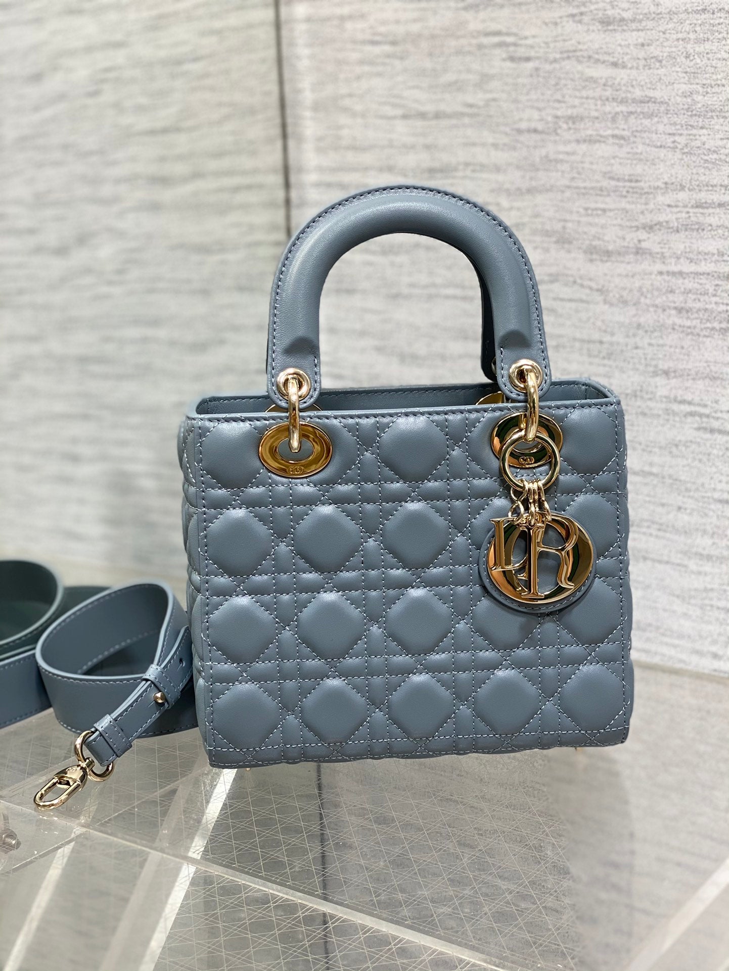 Dior Elegant Dusty Blue Quilted Leather Handbag with Shoulder Strap