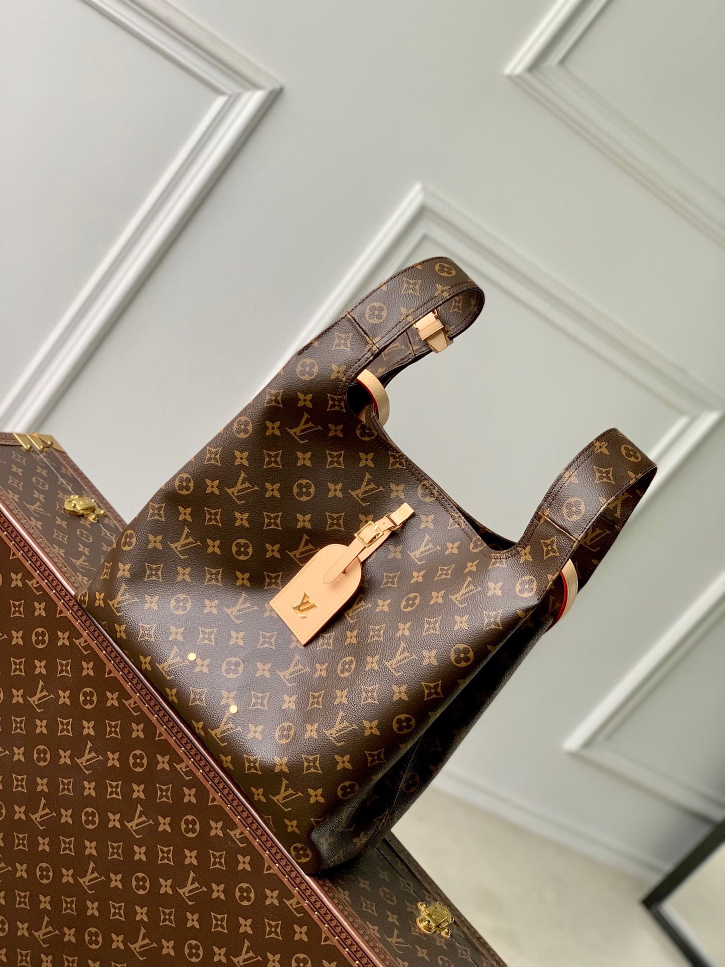Louis Vuitton Brown Monogram Asymmetric Canvas Triangle Hobo Bag