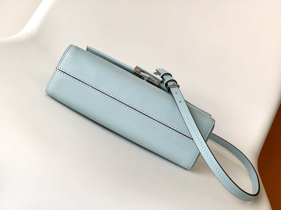 Louis Vuitton Classic Light Blue Textured Leather Crossbody Handbag with Top Handle