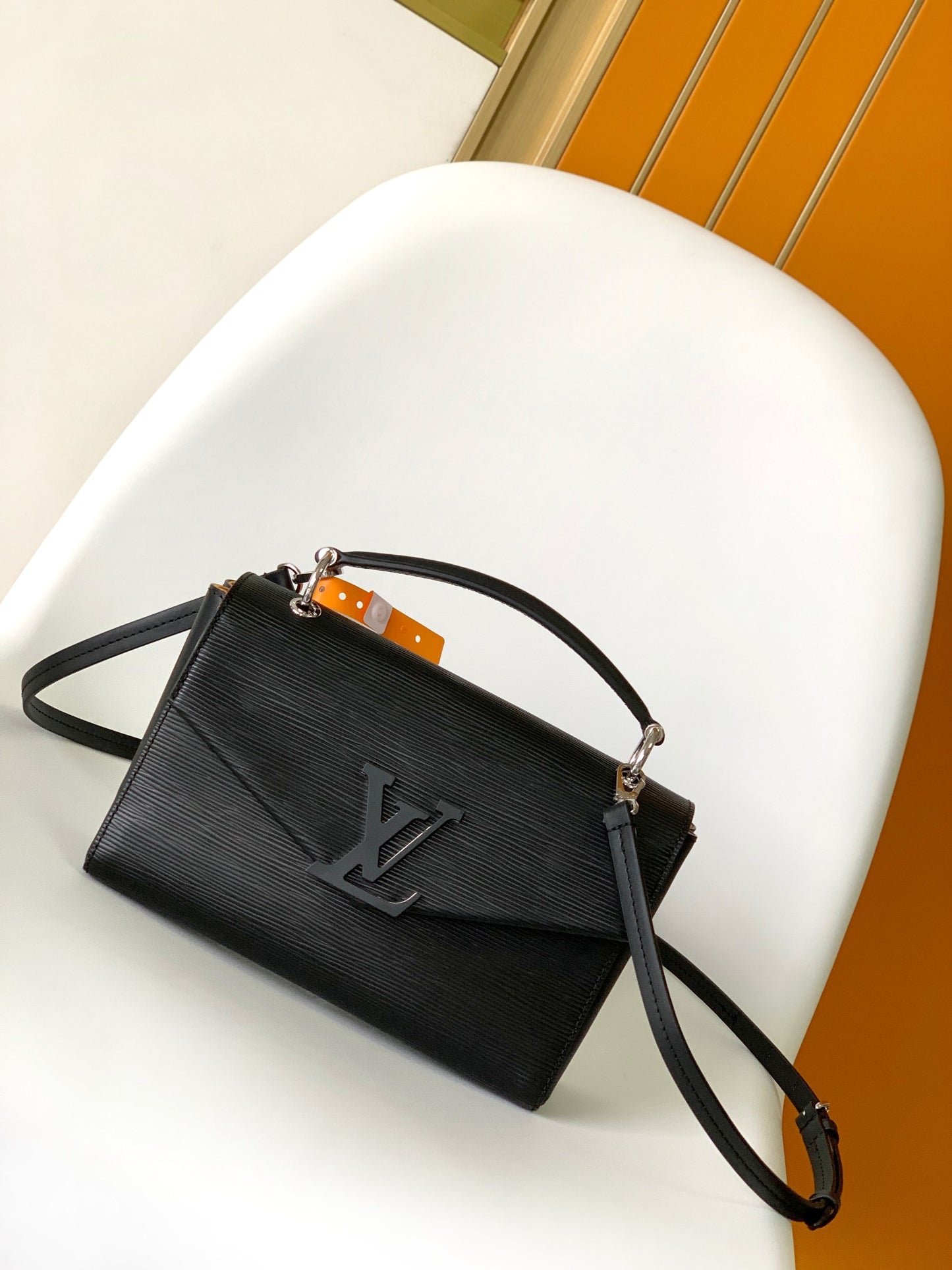 Louis Vuitton Elegant Black Textured Leather Crossbody Bag with Top Handle