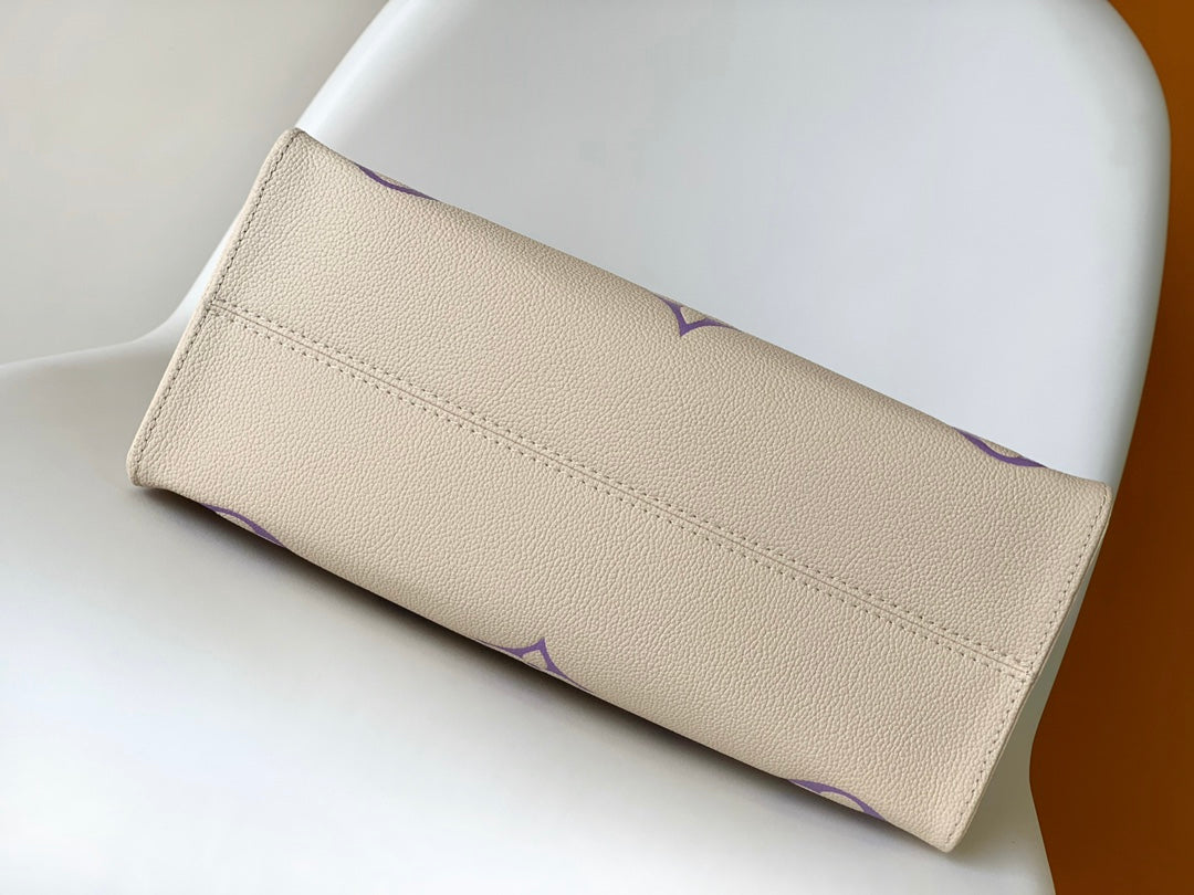 Louis Vuitton Elegant Cream Leather Tote Bag with Purple Monogram Print