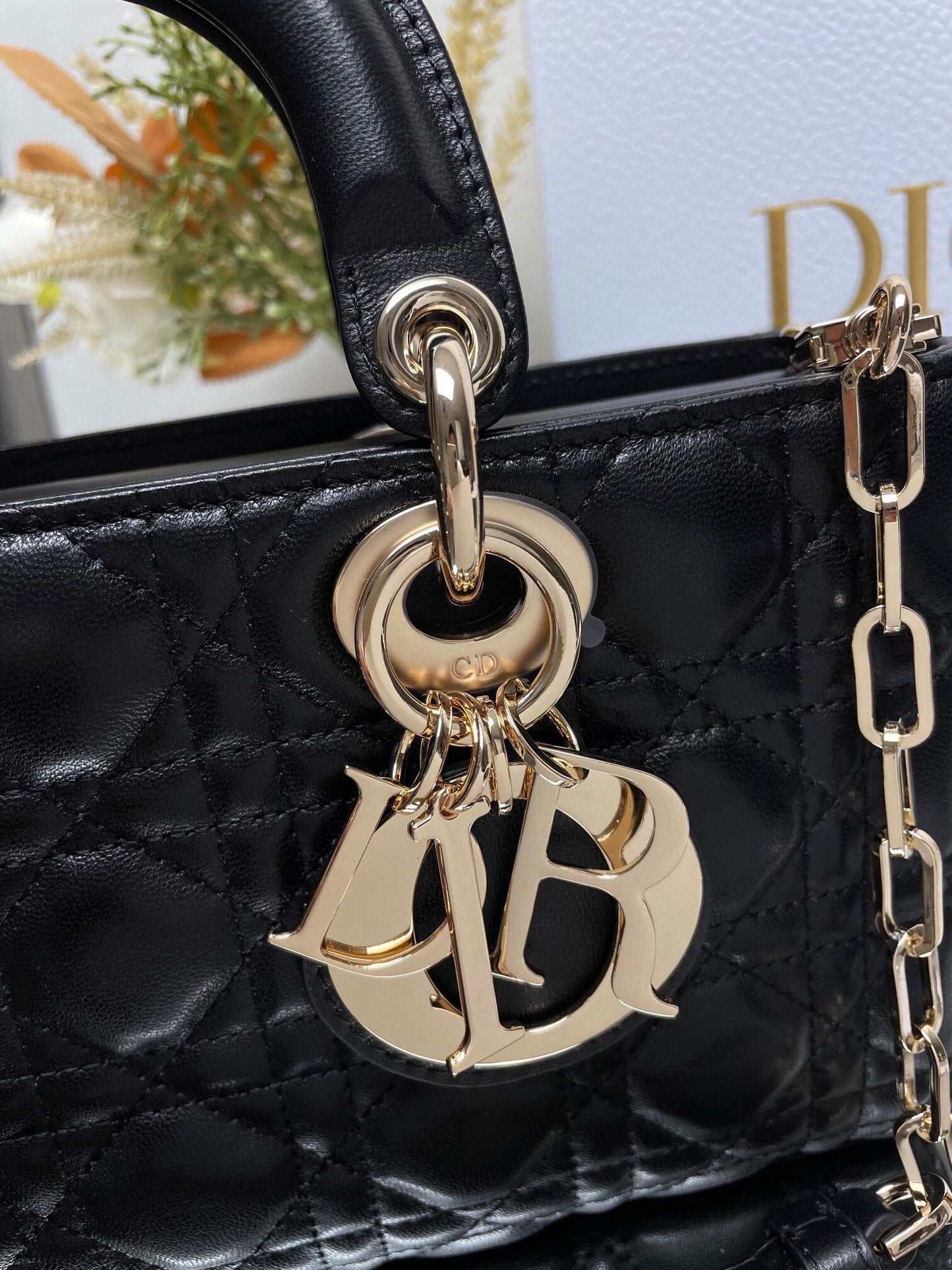 Dior Black Quilted Leather Top Handle Handbag with Gold Chain Strap