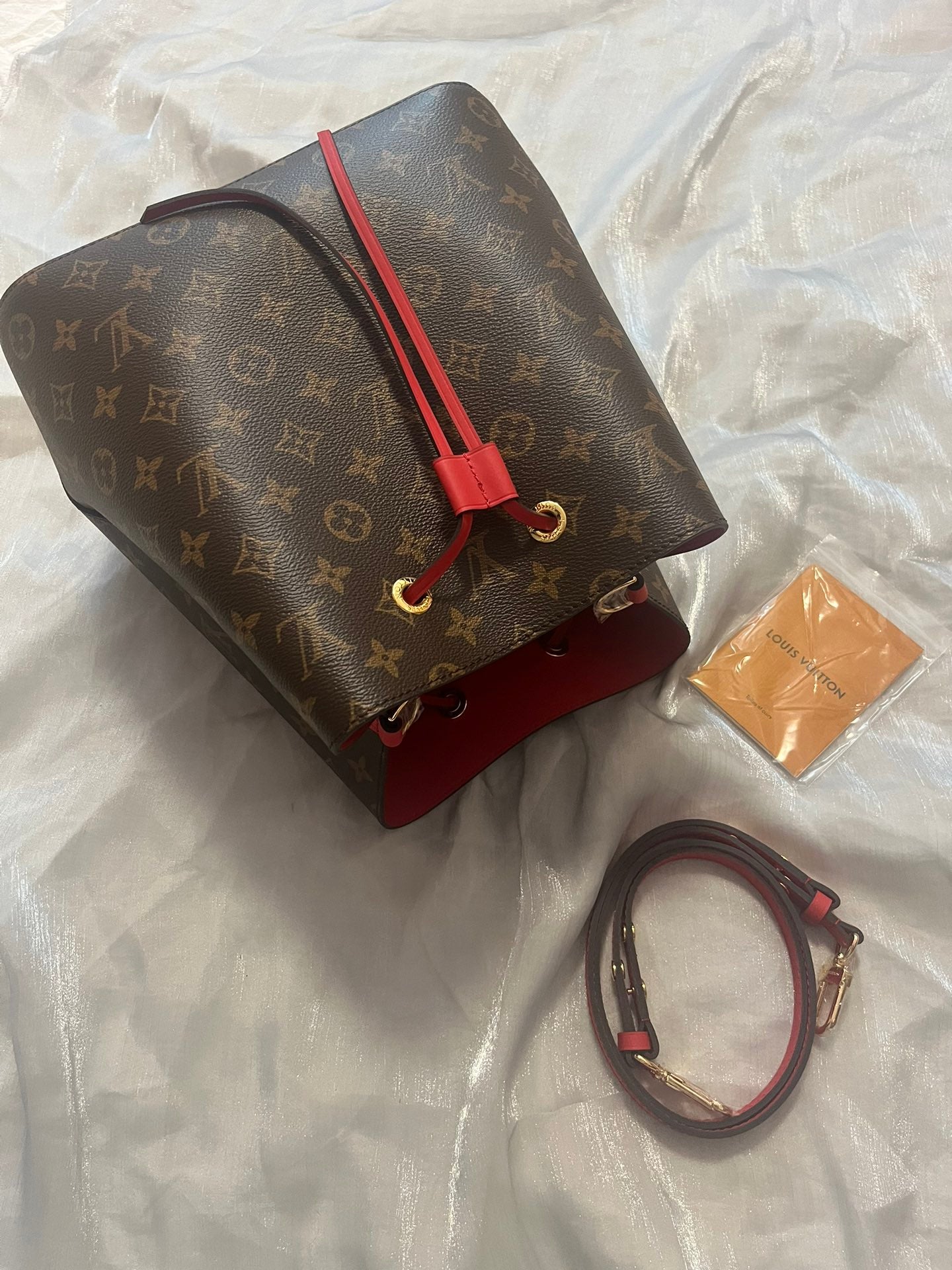Louis Vuitton Brown Monogram Canvas Drawstring Bucket Bag with Red Strap