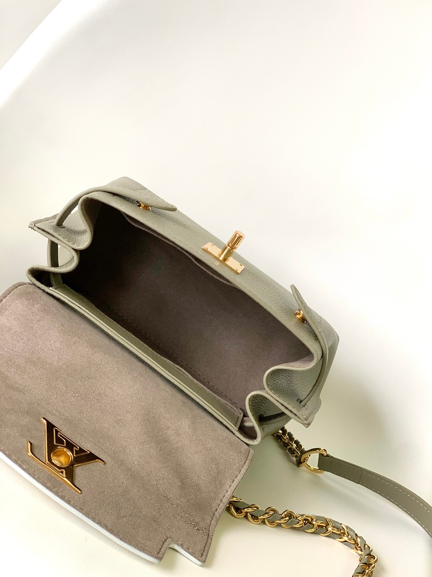Louis Vuitton Elegant Sage Green and Cream Leather Top Handle Handbag with Gold Clasp
