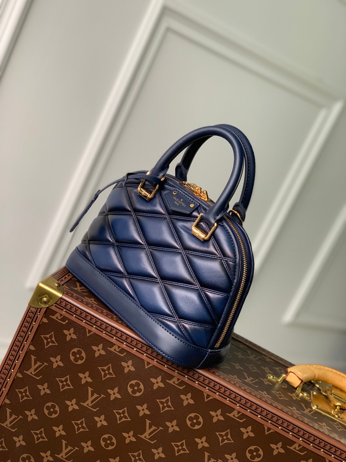 Louis Vuitton Elegant Navy Blue Quilted Leather Dome Handbag with Shoulder Strap