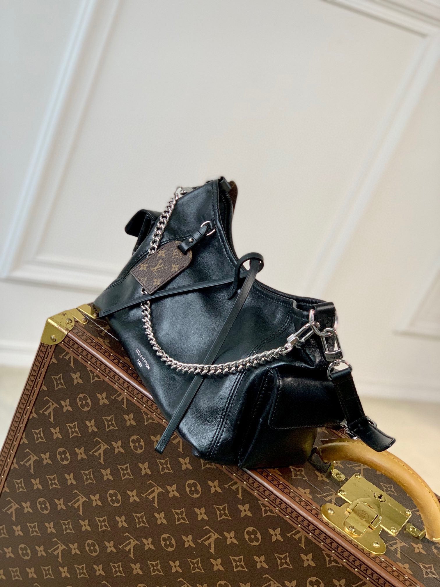 Women's Black Slouchy Leather Shoulder Bag with Silver Chain Accent