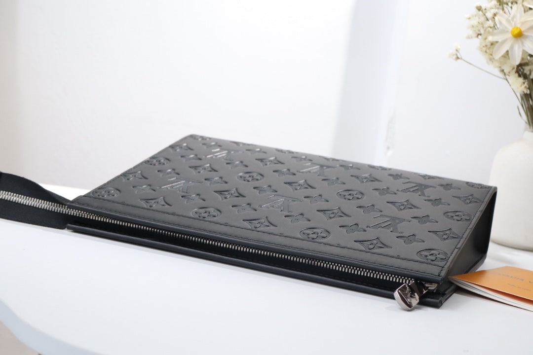 Louis Vuitton Elegant Black Embossed Monogram Leather Zip Clutch Pouch