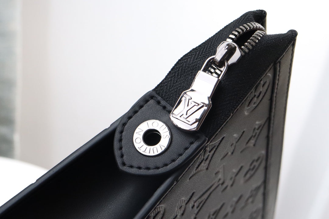 Louis Vuitton Elegant Black Embossed Monogram Leather Zip Clutch Pouch