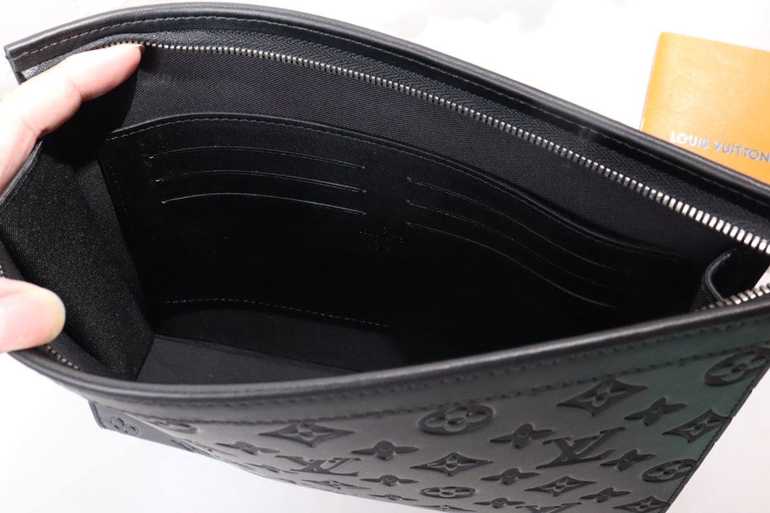 Louis Vuitton Elegant Black Embossed Monogram Leather Zip Clutch Pouch