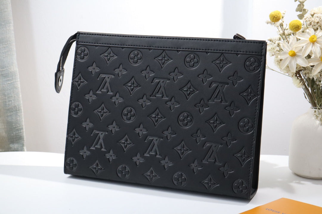 Louis Vuitton Elegant Black Embossed Monogram Leather Zip Clutch Pouch