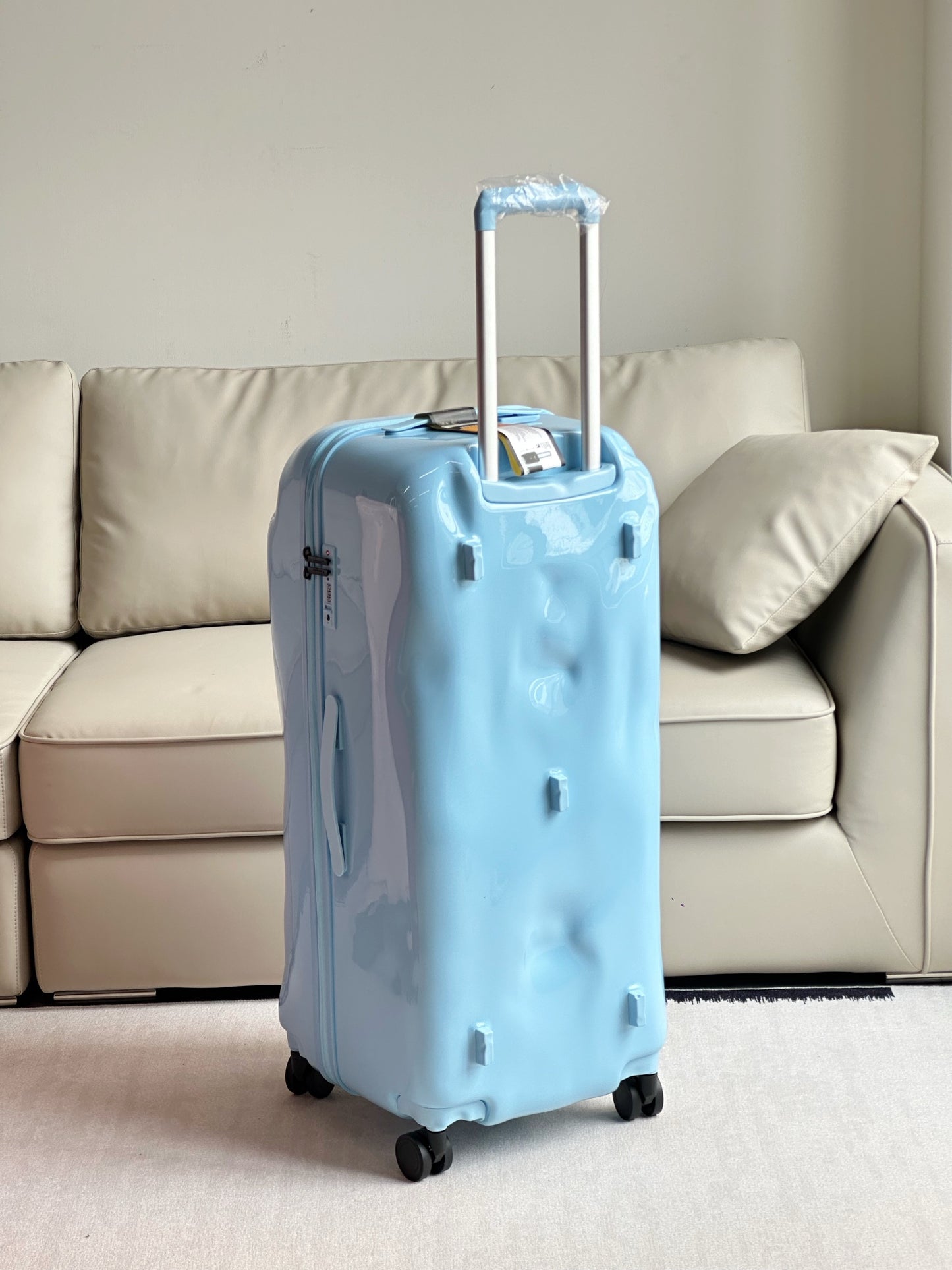 Modern Light Blue Dented Hardshell Spinner Luggage