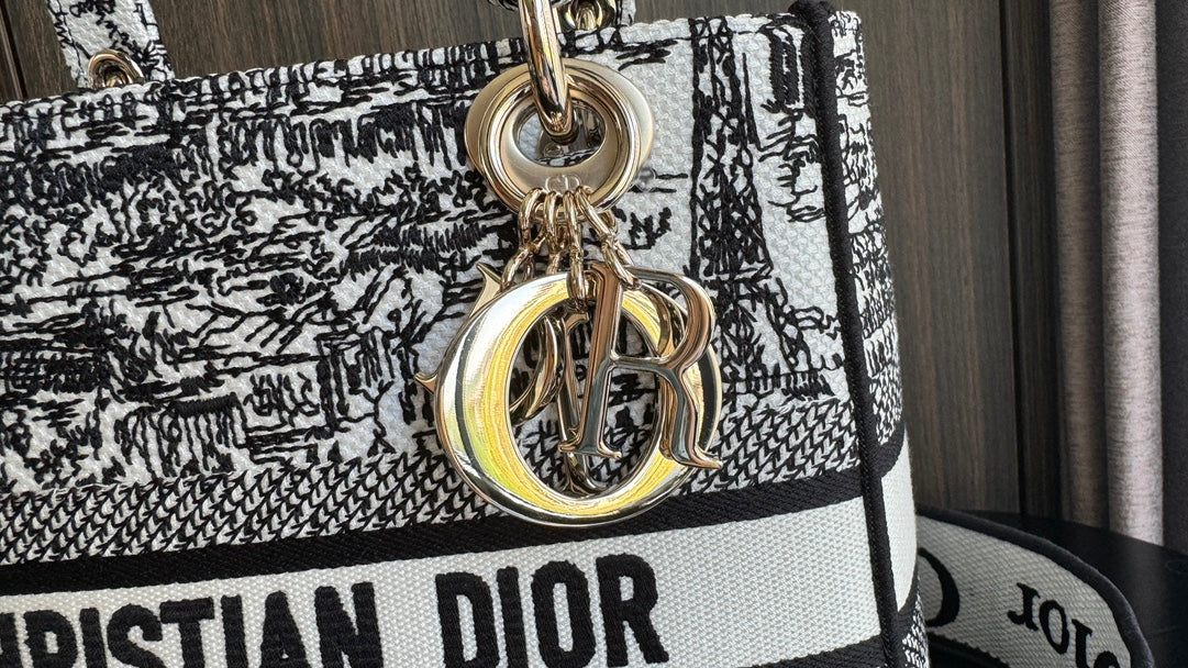 Dior Elegant Black and White Embroidered Canvas Top-Handle Handbag