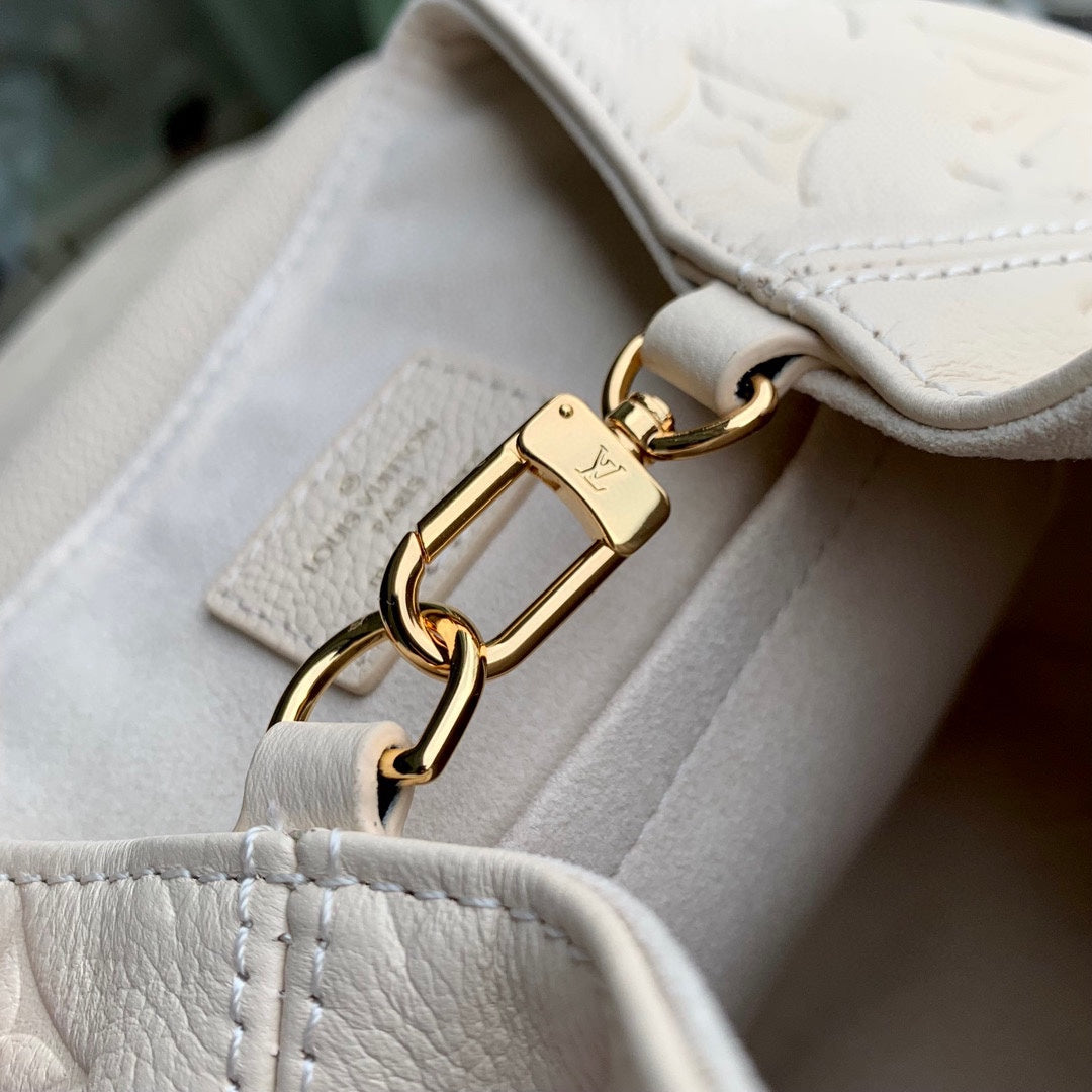 Louis Vuitton Off-White Embossed Leather Mini Backpack with Front Pockets