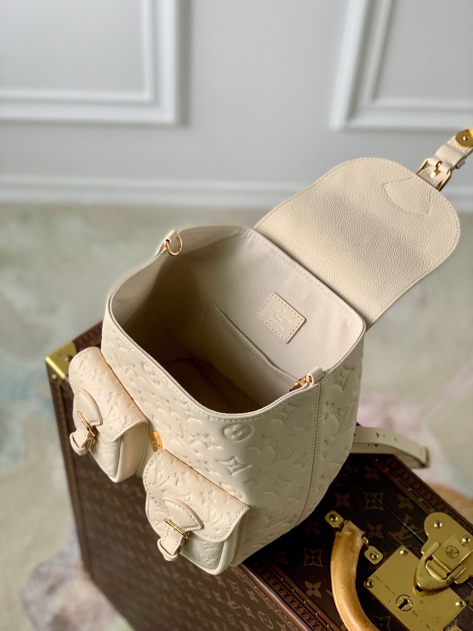 Louis Vuitton Off-White Embossed Leather Mini Backpack with Front Pockets
