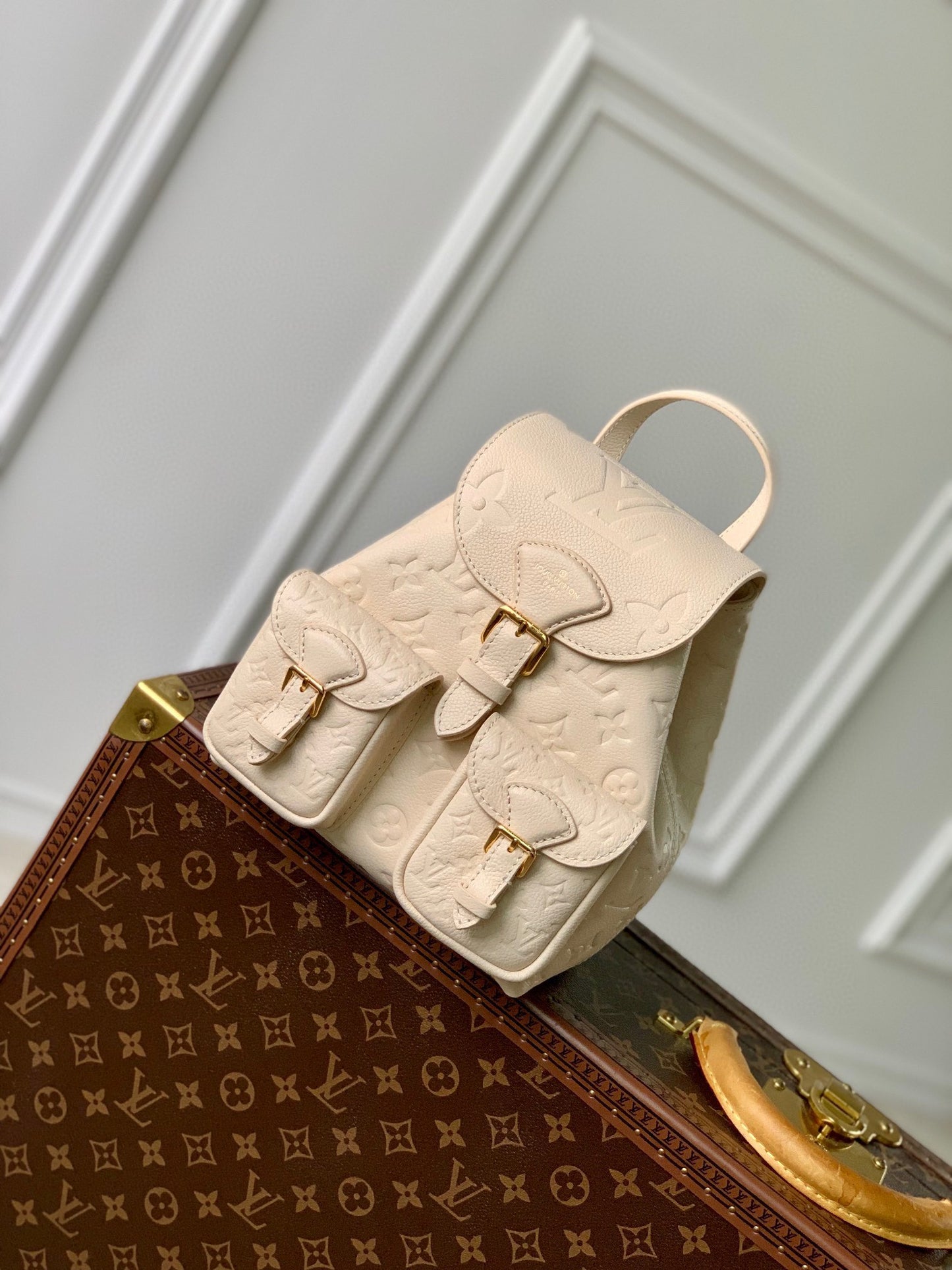Louis Vuitton Off-White Embossed Leather Mini Backpack with Front Pockets