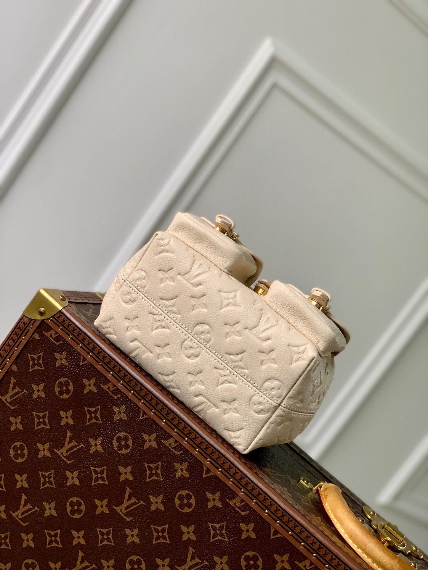 Louis Vuitton Off-White Embossed Leather Mini Backpack with Front Pockets