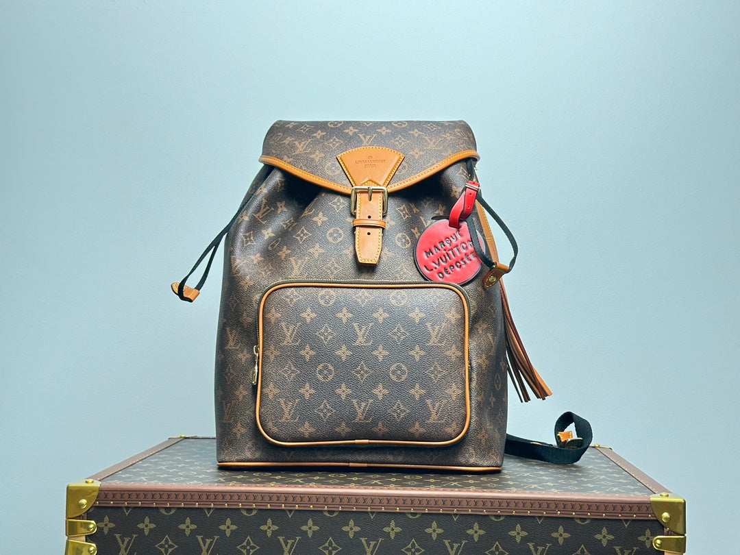Louis Vuitton Vintage Monogram Pattern Leather Backpack with Buckle and Tassel