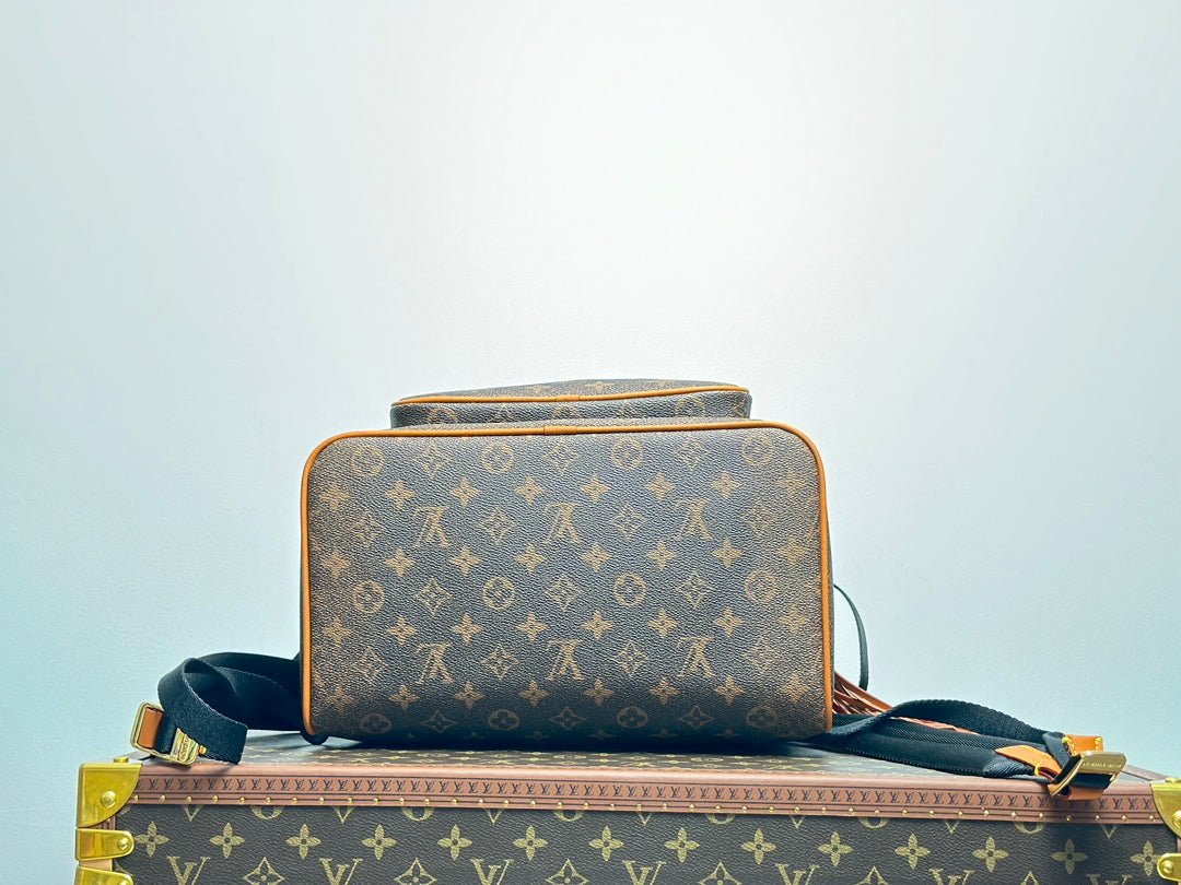Louis Vuitton Vintage Monogram Pattern Leather Backpack with Buckle and Tassel