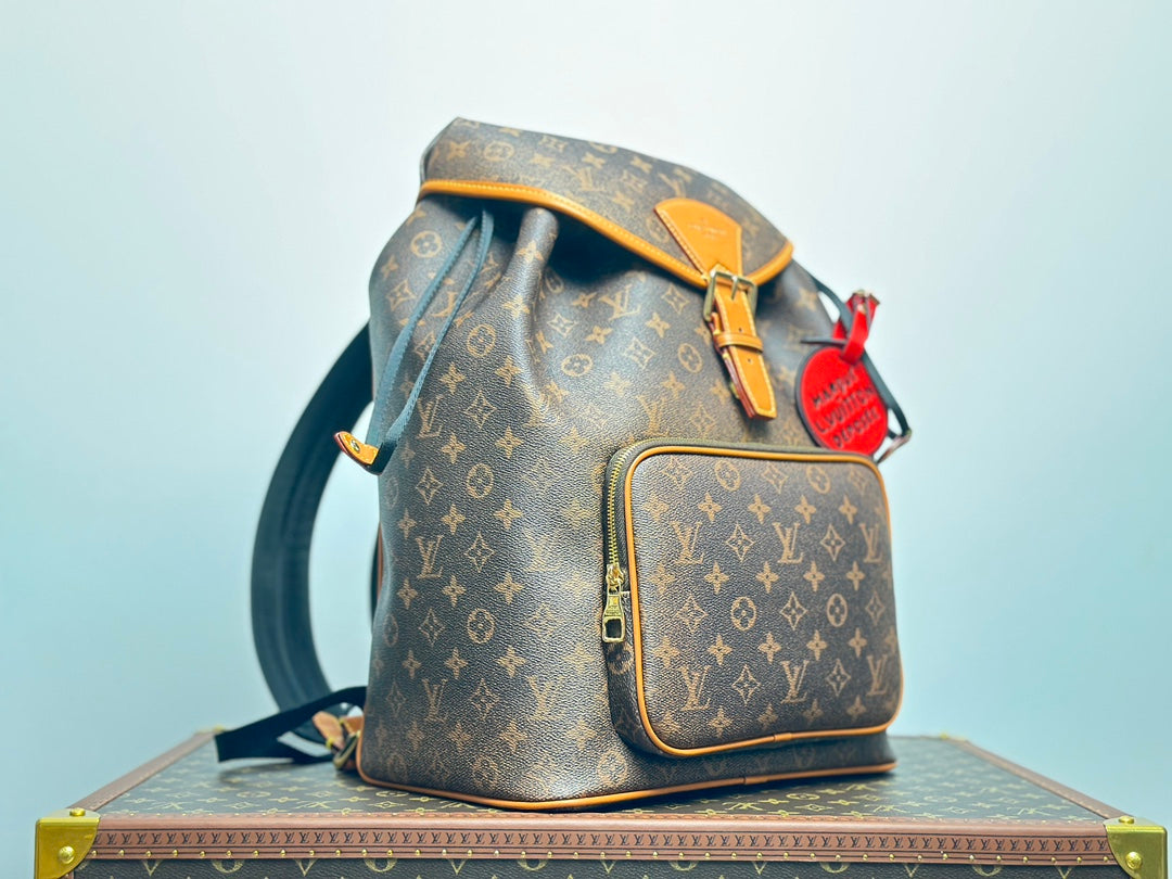 Louis Vuitton Vintage Monogram Pattern Leather Backpack with Buckle and Tassel