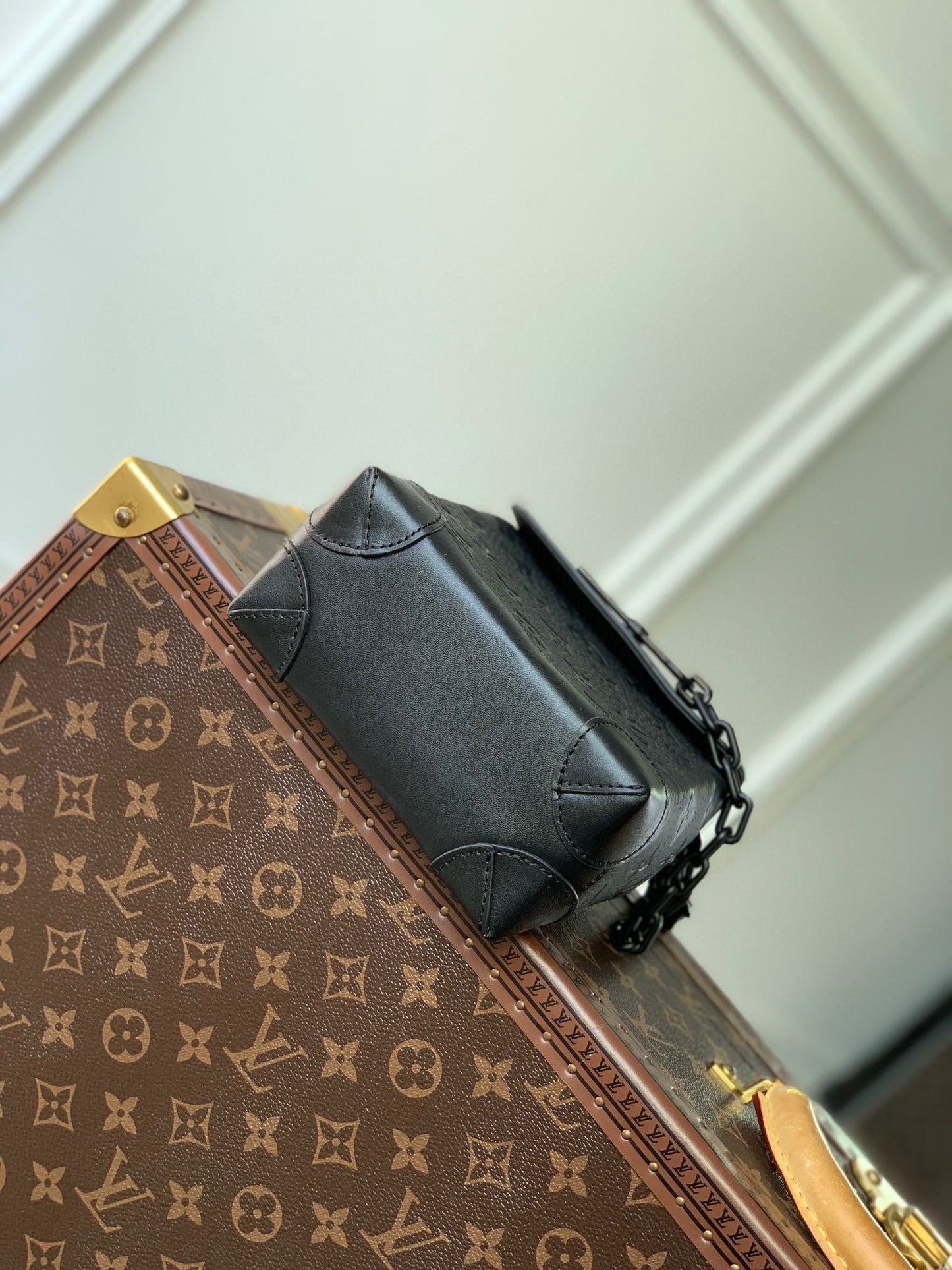 Louis Vuitton Matte Black Embossed Leather Mini Backpack Crossbody Bag with Chain Detail