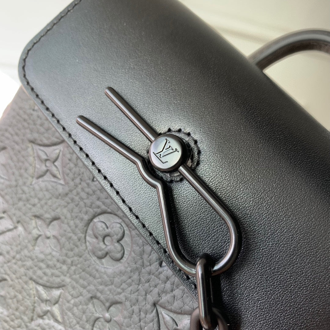 Louis Vuitton Matte Black Embossed Leather Mini Backpack Crossbody Bag with Chain Detail