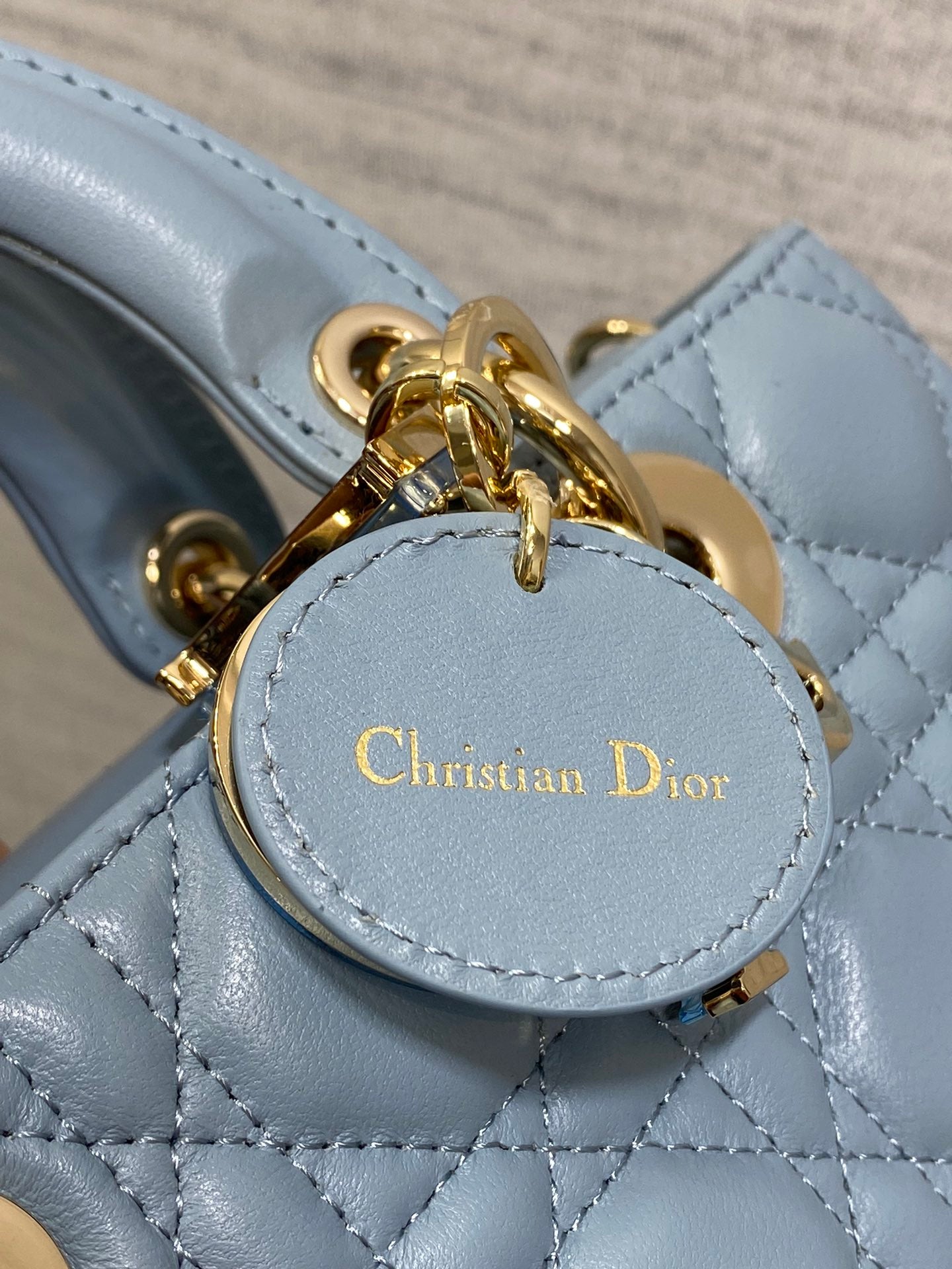 Dior Elegant Light Blue Quilted Leather Crossbody Bag with Top Handle