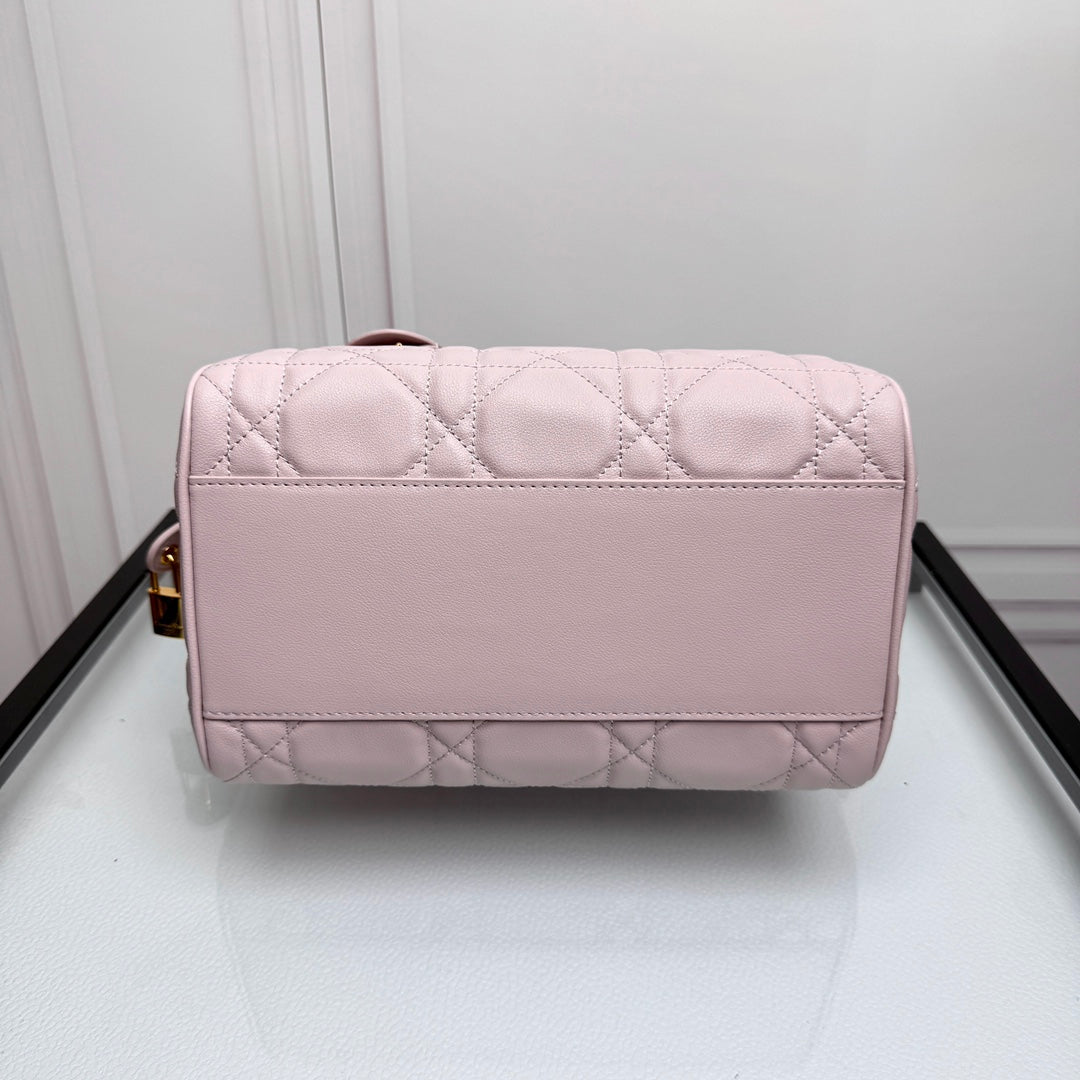 Pink Quilted Leather Boston Bag with Star Charm and Shoulder Strap