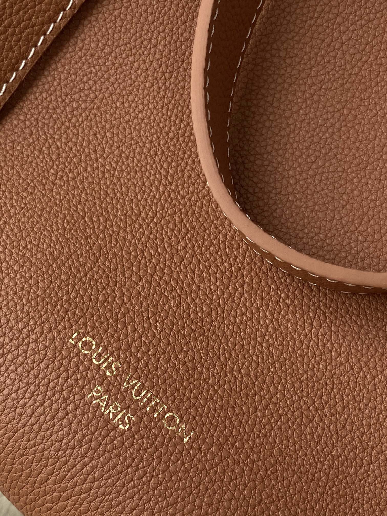 Louis Vuitton Classic Brown Leather Tote Bag with Gold Lock Accent and Shoulder Straps