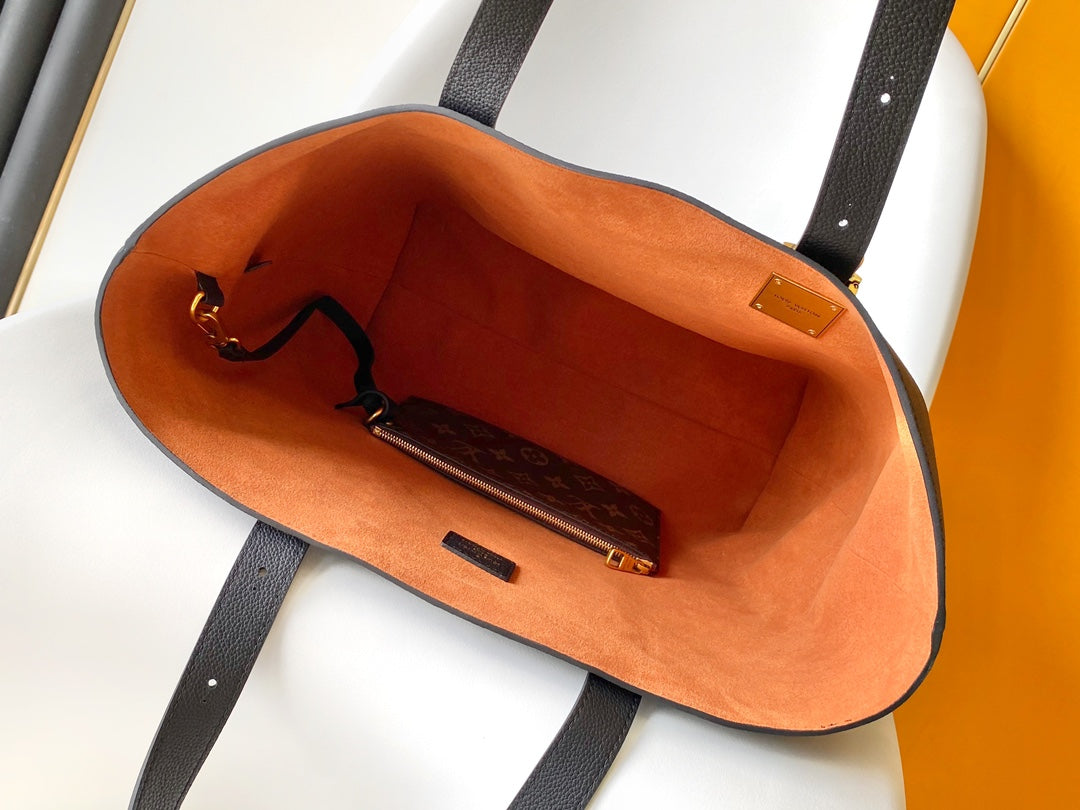 Louis Vuitton Classic Brown Leather Tote Bag with Gold Lock Accent and Shoulder Straps