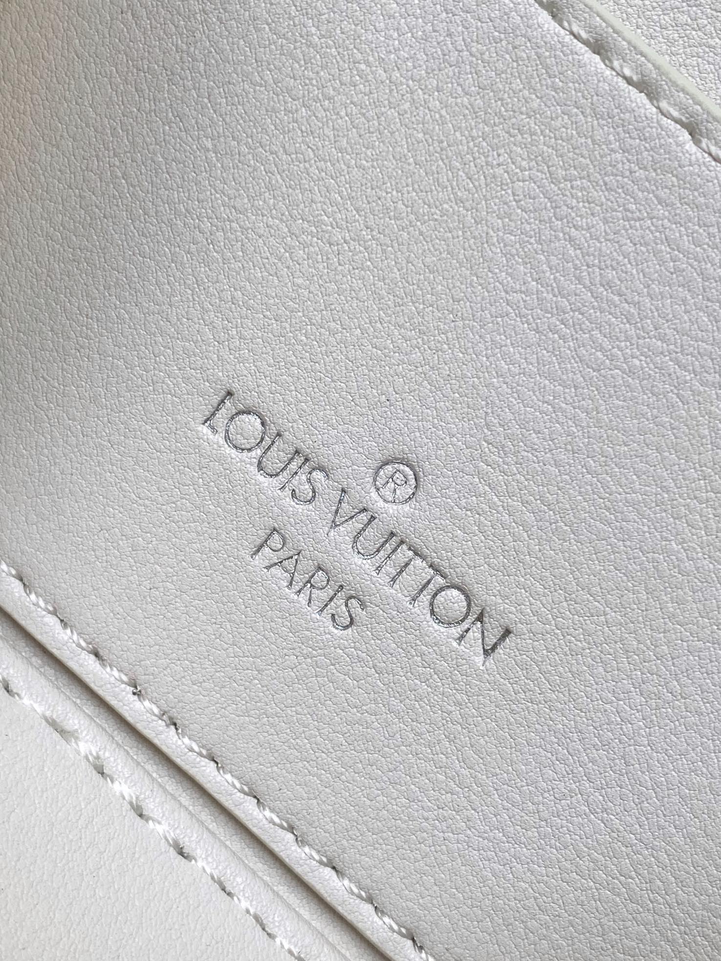 Louis Vuitton Elegant Off-White Embossed Leather Vanity Case Handbag