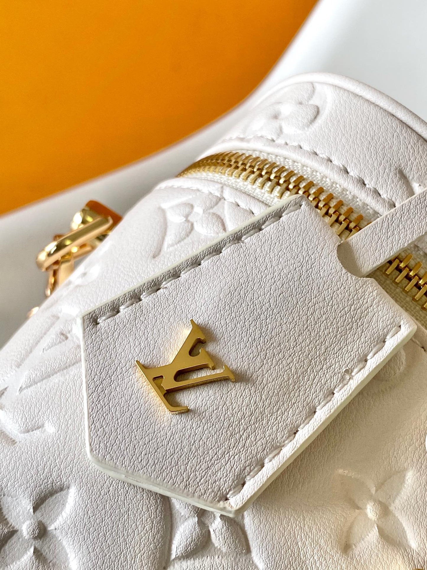 Louis Vuitton Elegant Off-White Embossed Leather Vanity Case Handbag