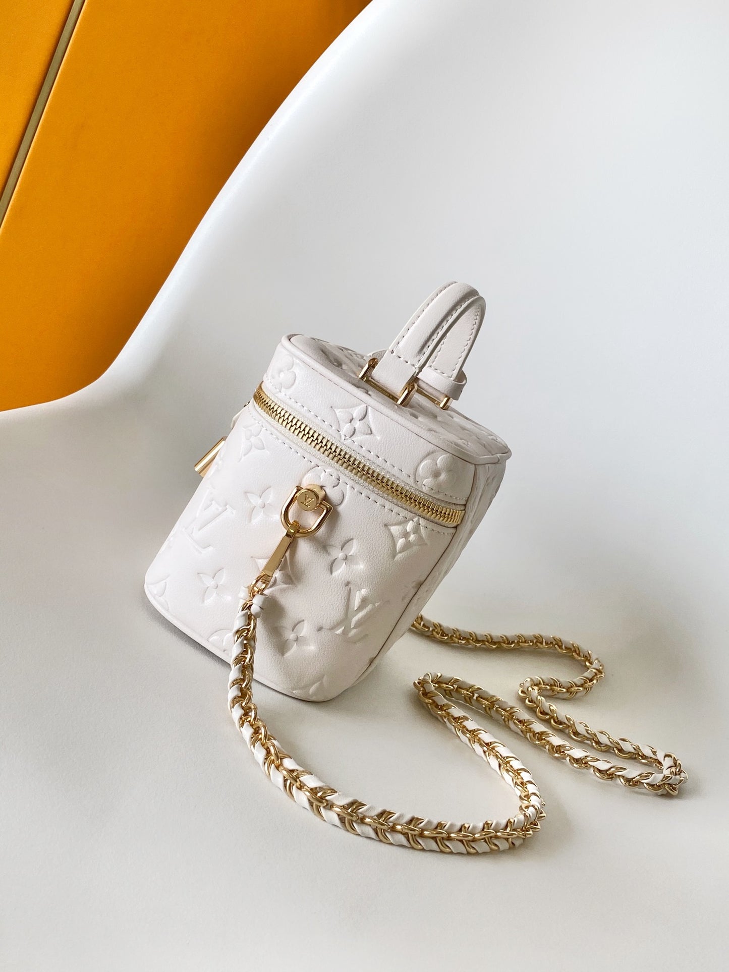 Louis Vuitton Elegant Off-White Embossed Leather Vanity Case Handbag