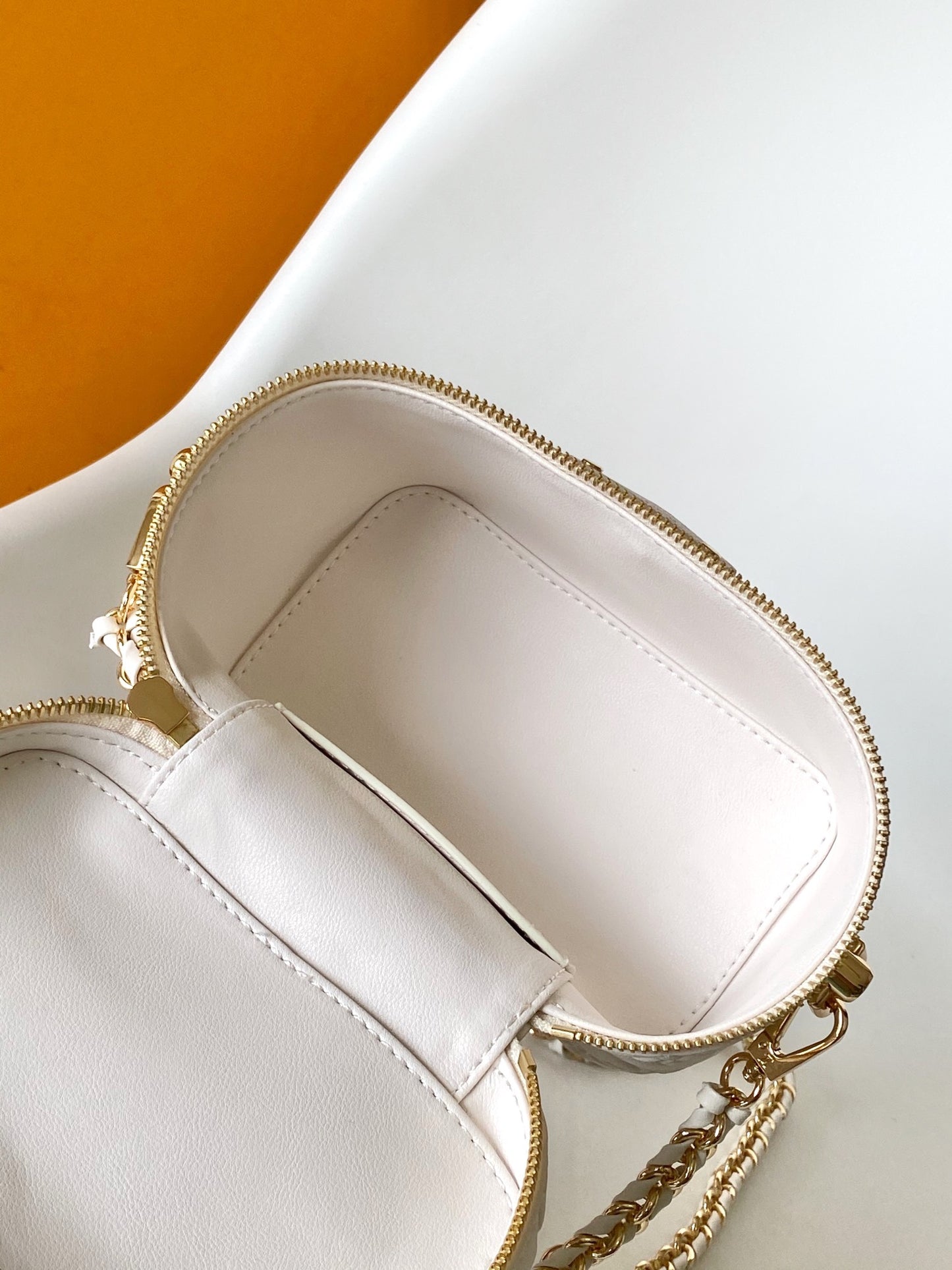 Louis Vuitton Elegant Off-White Embossed Leather Vanity Case Handbag