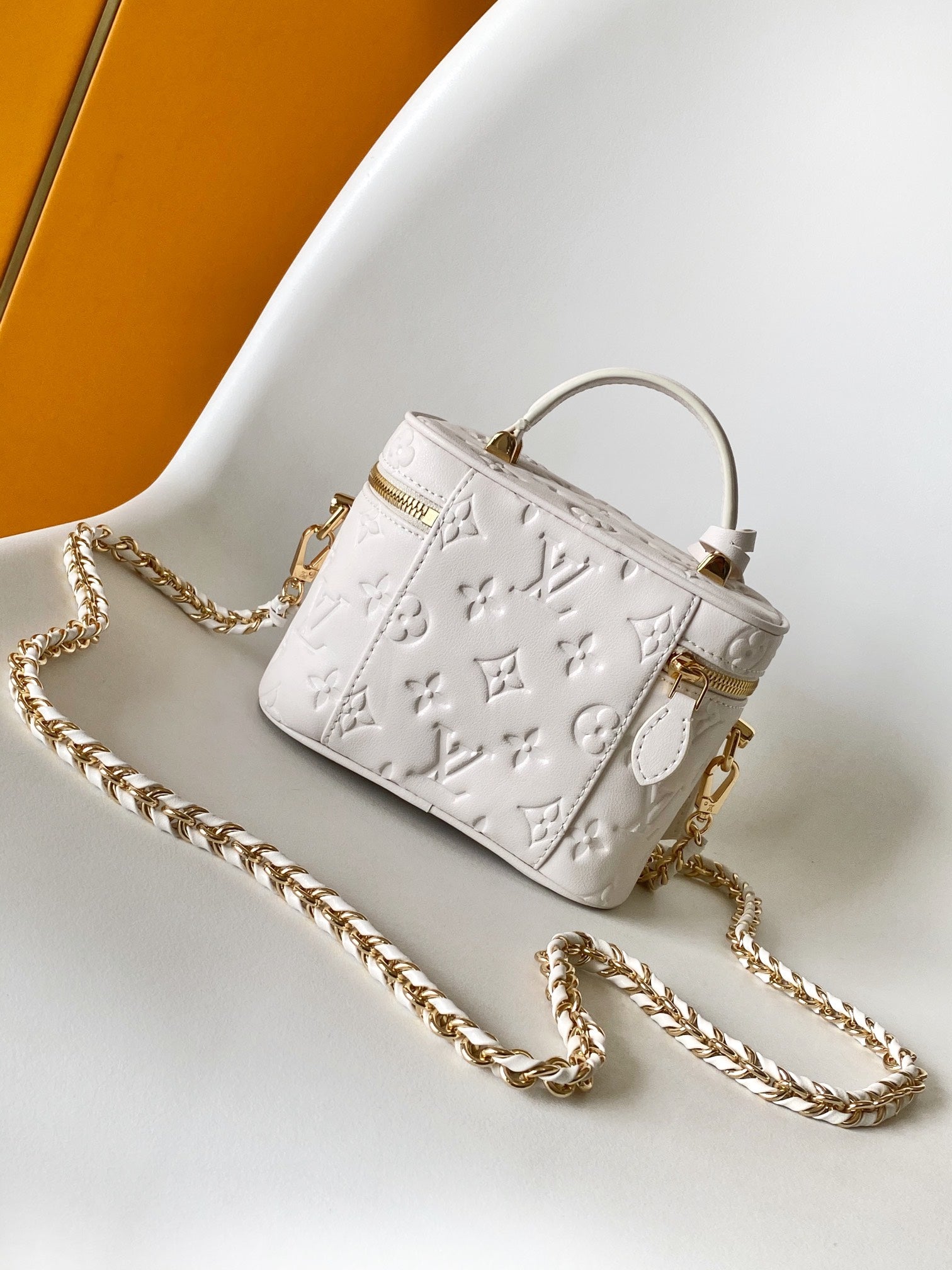 Louis Vuitton Elegant Off-White Embossed Leather Vanity Case Handbag